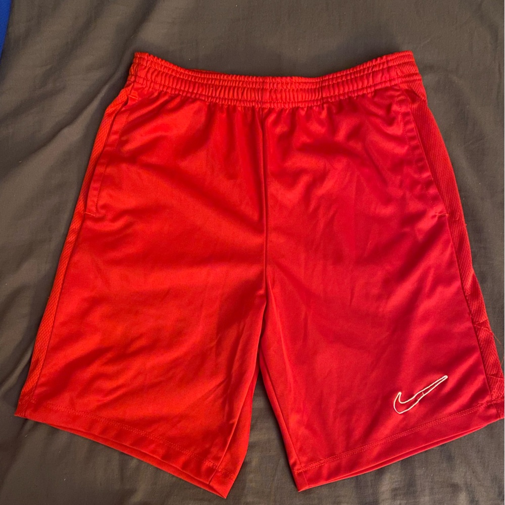 Red Nike shorts